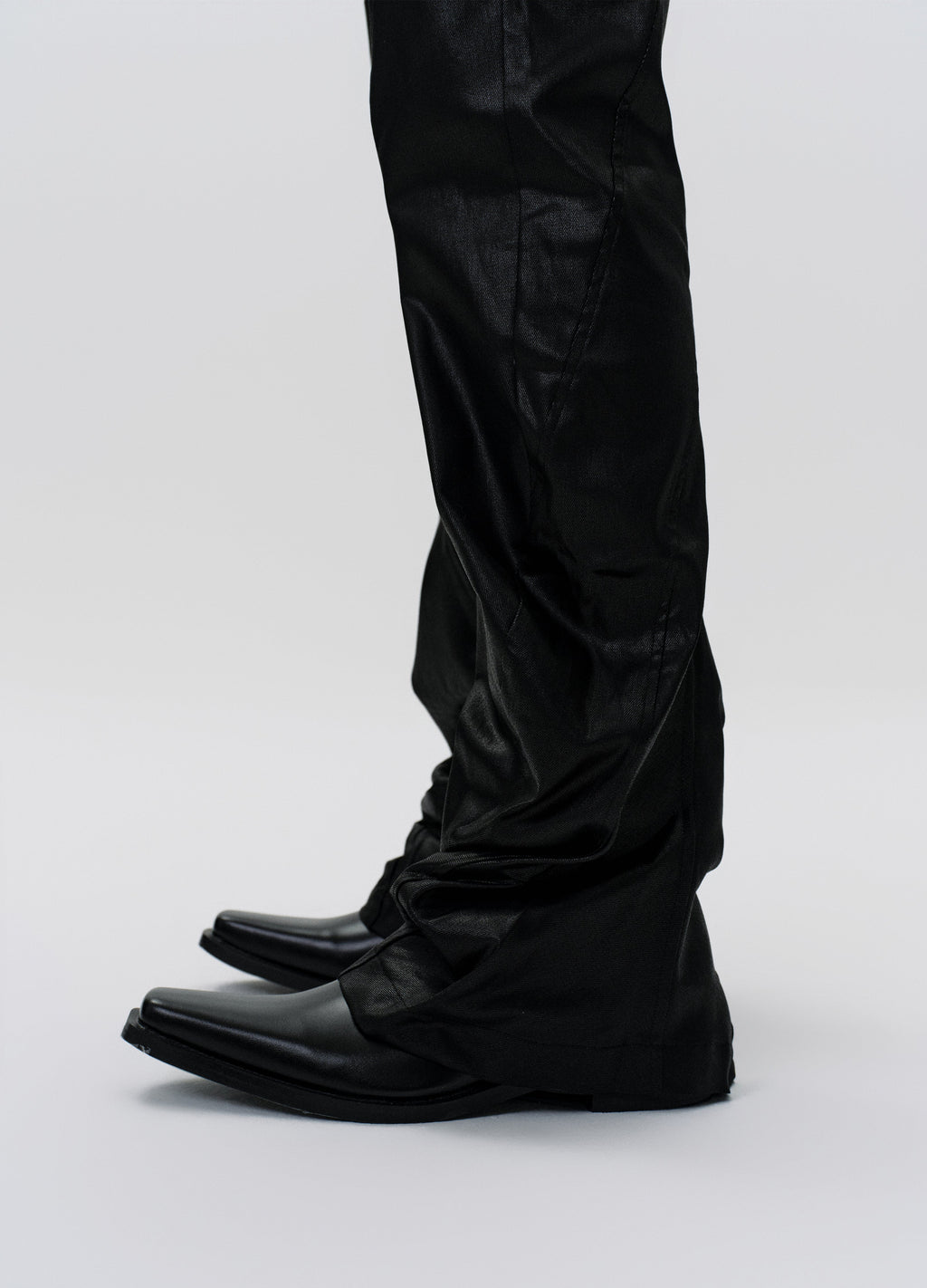 25SS TWISTED WAX COATED PANTS