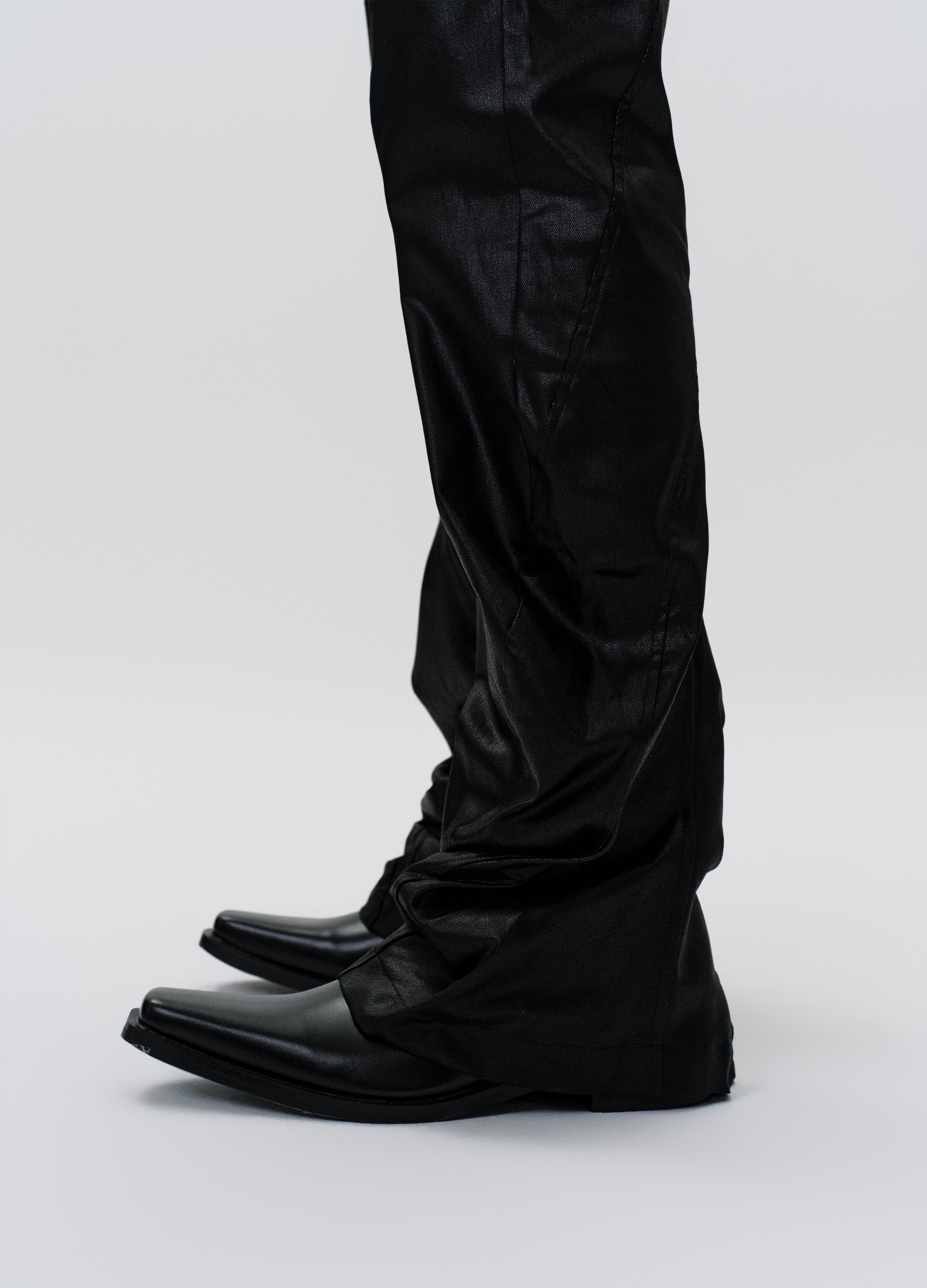25SS TWISTED WAX COATED PANTS