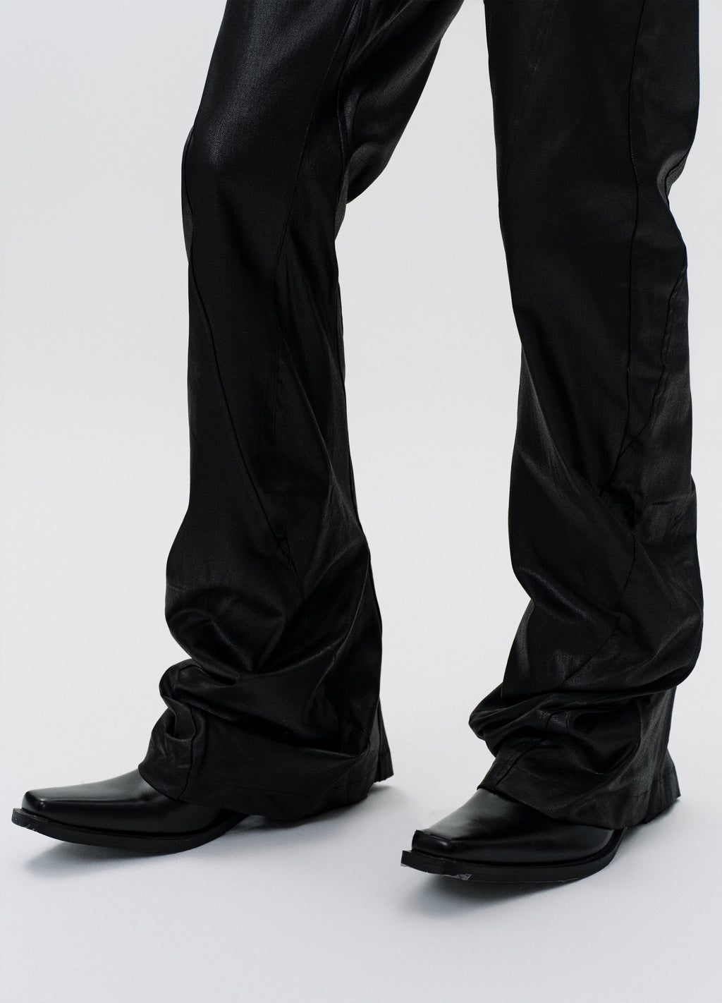 25SS TWISTED WAX COATED PANTS