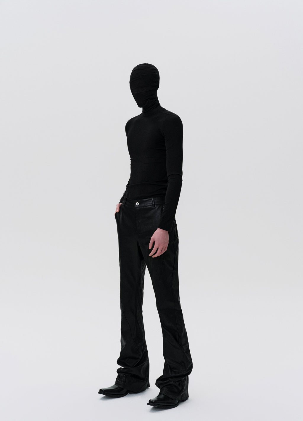 25SS TWISTED WAX COATED PANTS