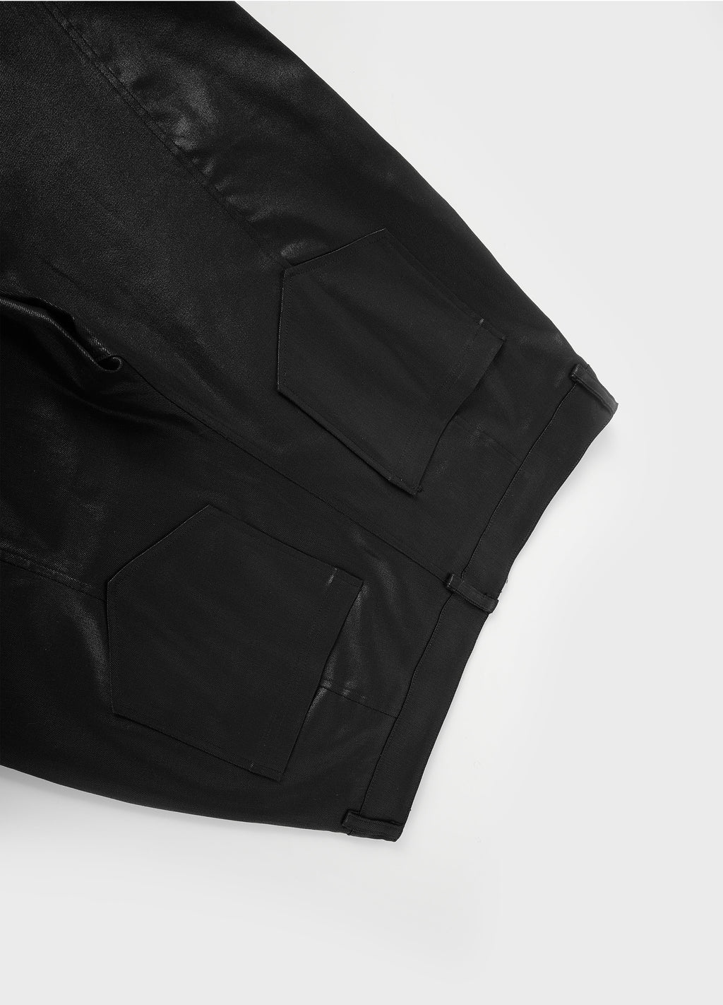 25SS TWISTED WAX COATED PANTS